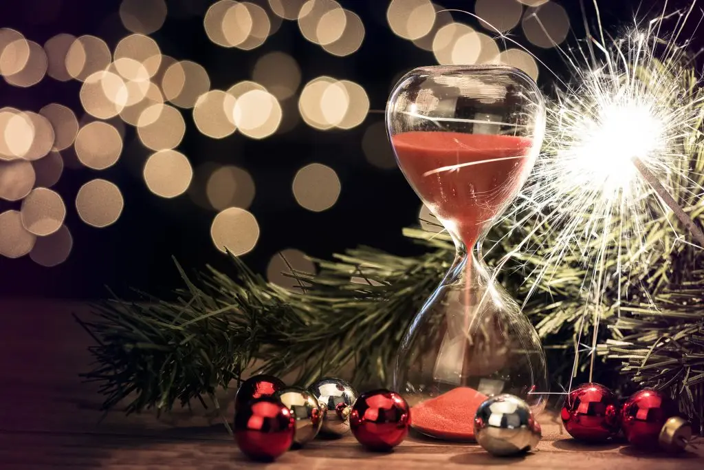 A timer surrounded by festive decorations