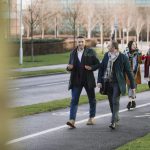 Businesspeople are walking to work in the city.