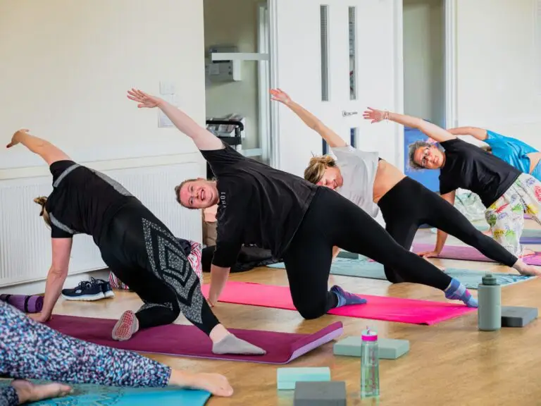 A Pilates class stretches